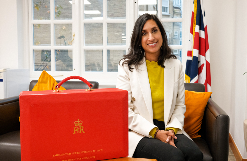 Claire in her Ministerial office, sat next to her red box.