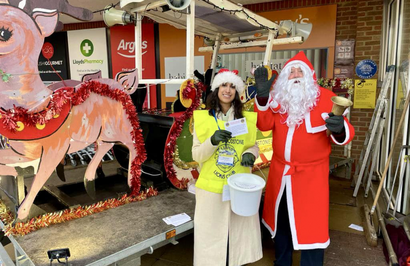 Claire collecting money for the appeal with Father Christmas