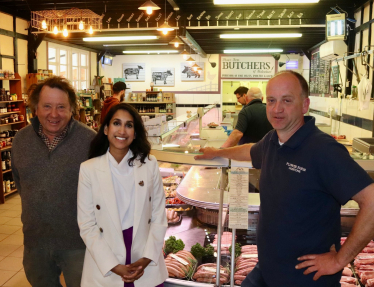 Claire with local farmers